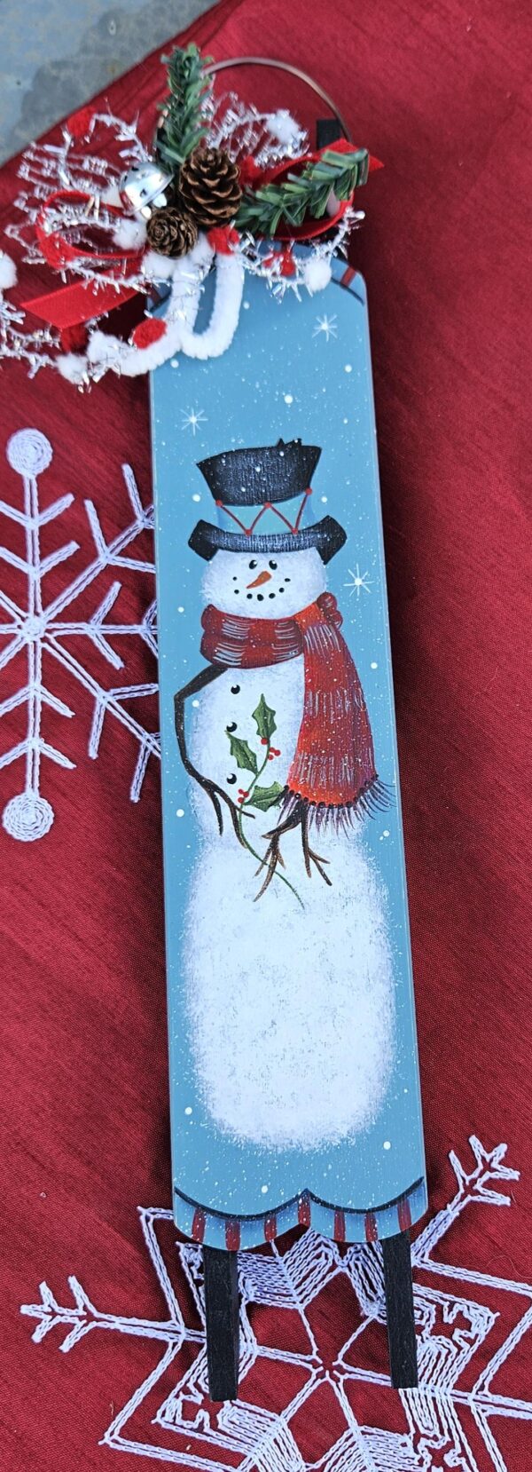 Snowman on Sled