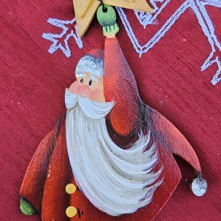 Hanging from a Star Santa Ornament
