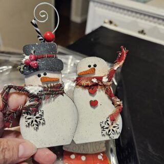 Snow couple ornament